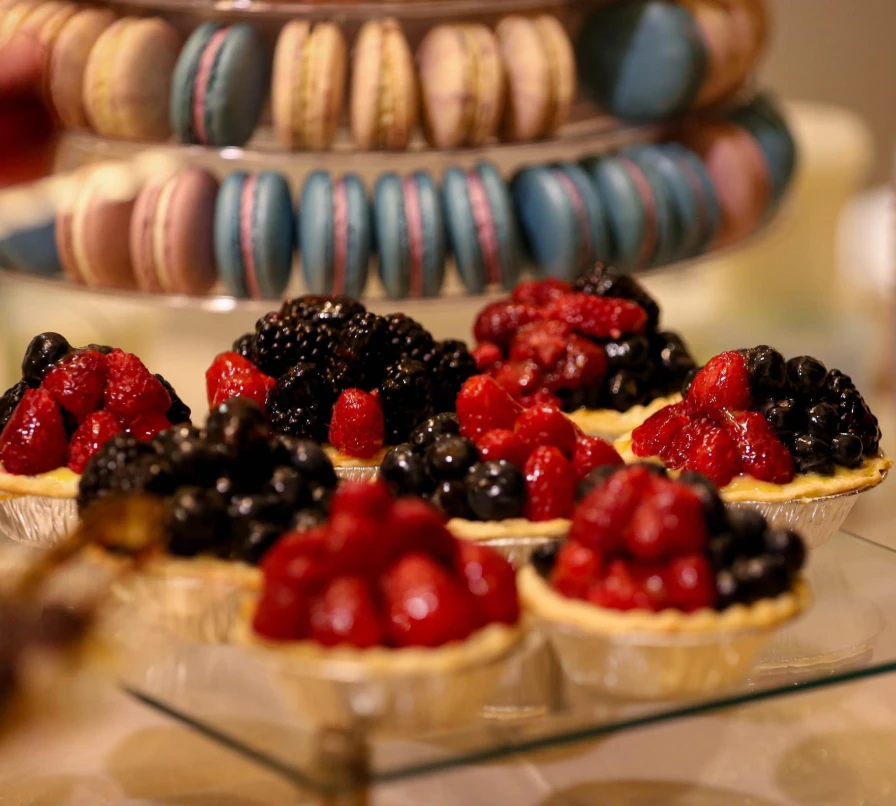 Fruit tarts and colorful macarons